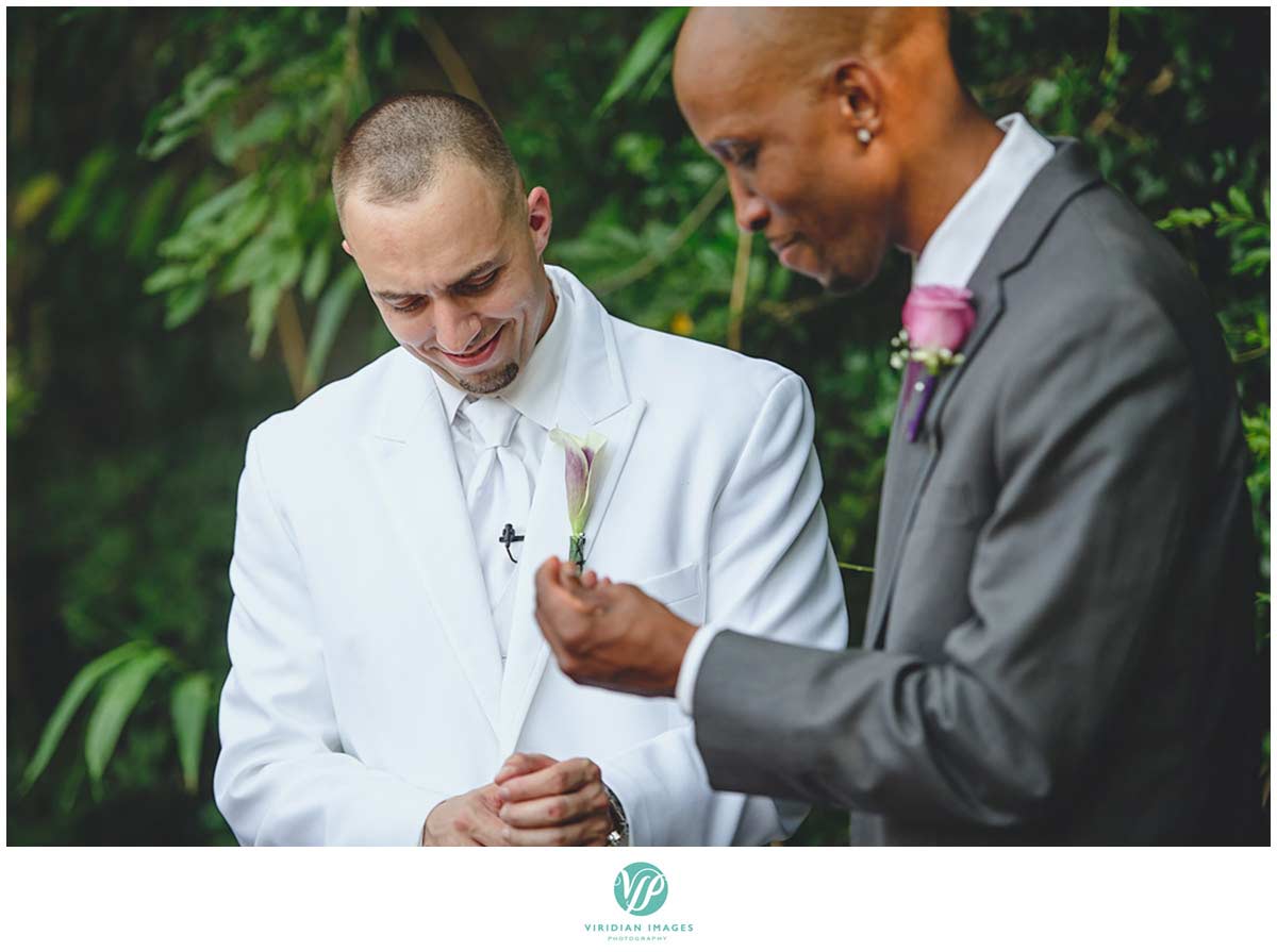 Atlanta-wedding-photographers-groom-white-tux-nerves-interracial-photo-5