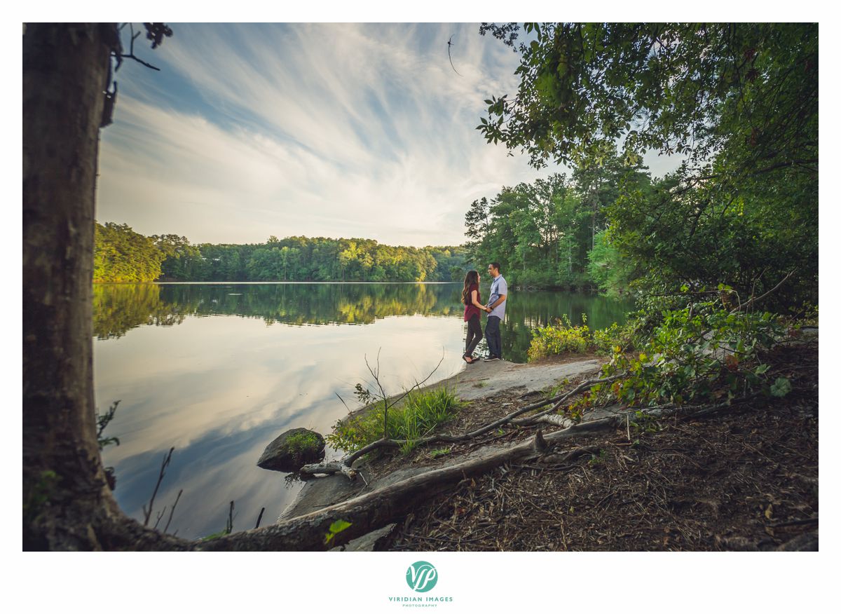 couple together near lake at stone mountain park