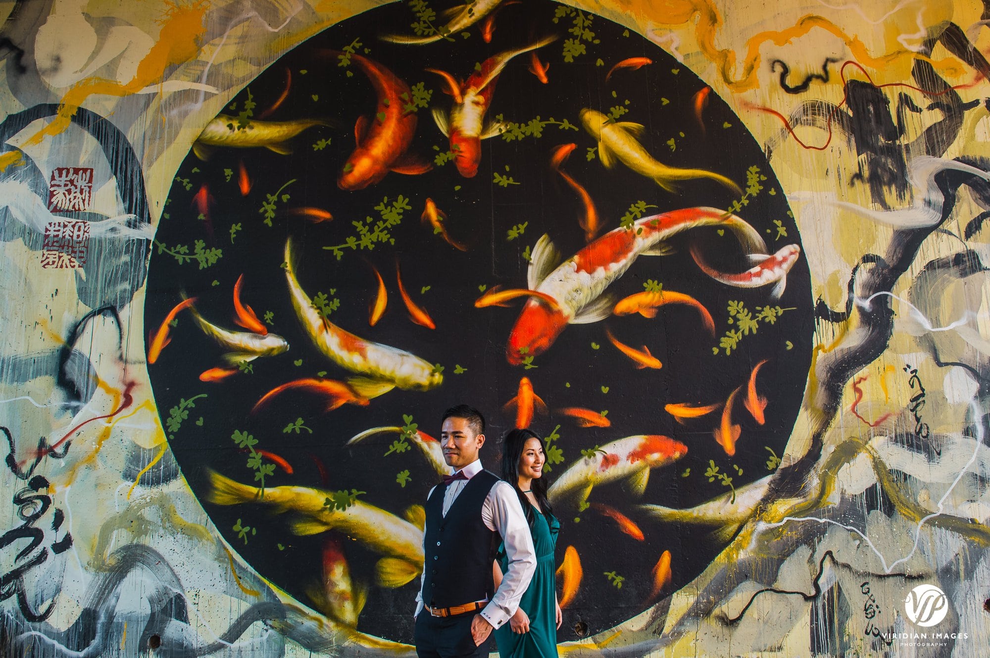 editorial portrait front of fish mural beltline