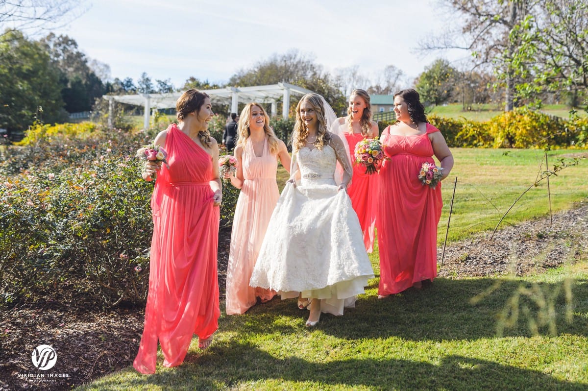 Bride with bridesmaids walking Walnut Hill Farm