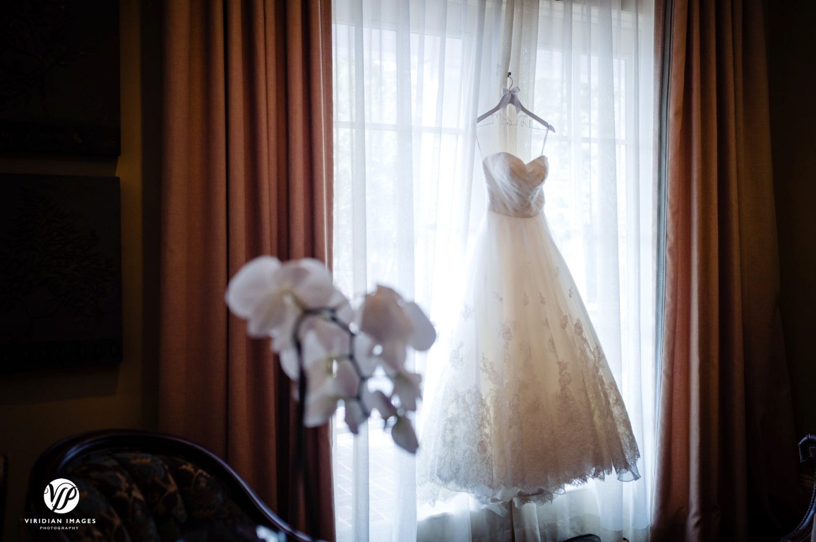 wedding gown hanging window
