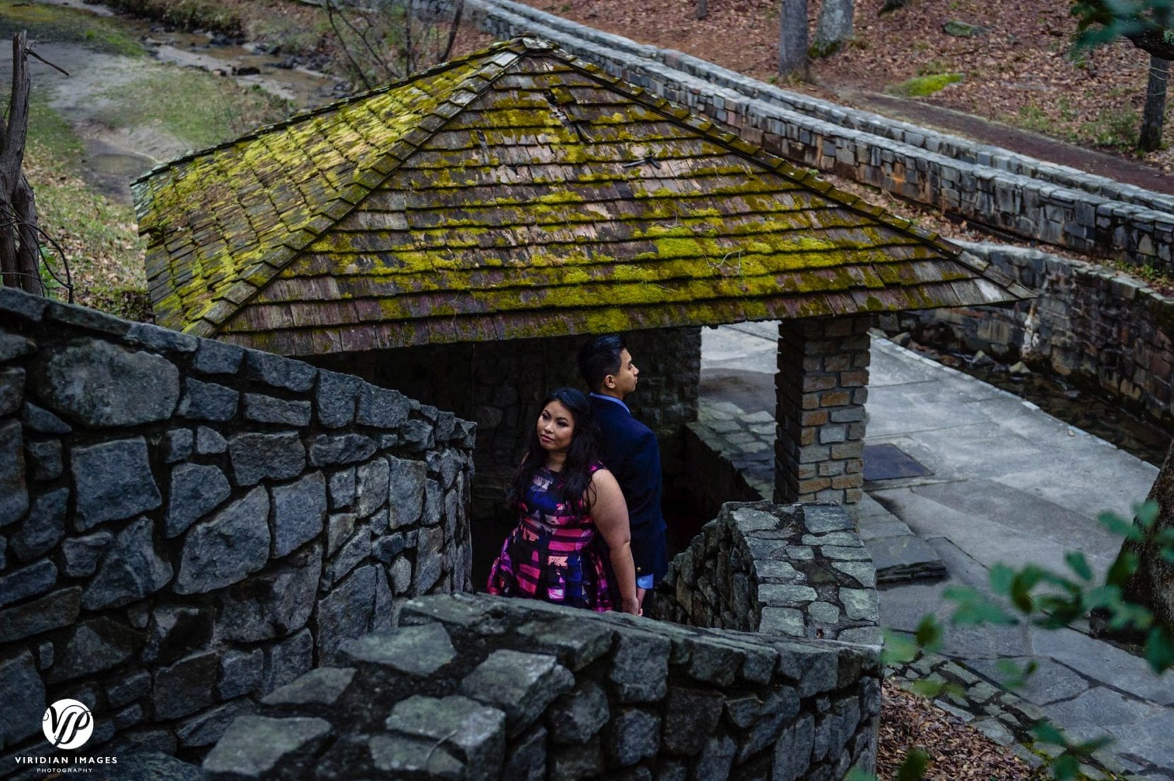 creative photo couple back to back on stone stairs engagement photo in stone mountain park atlanta