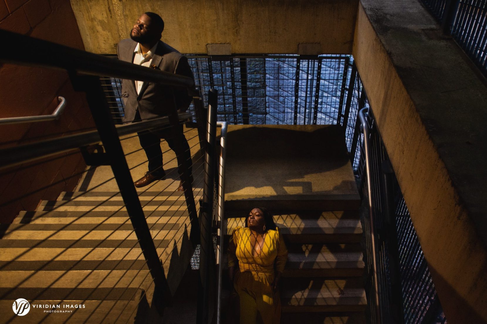 creative engagement photo in a stairwell near the Atlanta Botanical Gardens during rain storm