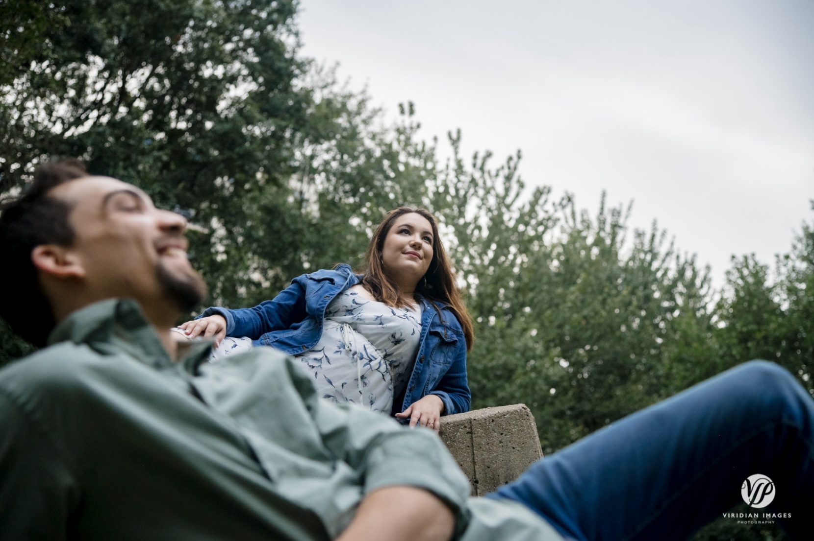 unique couple photo on concrete wall during engagement session in Atlanta