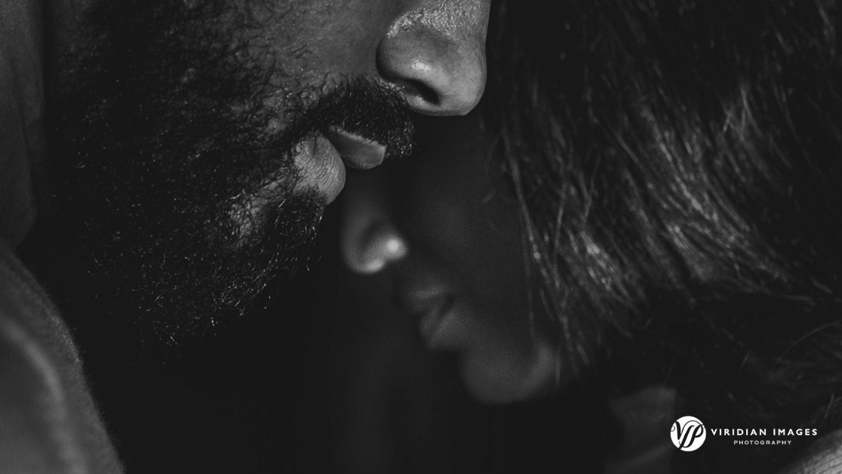 close-up photo of couple's engagement session in black and white