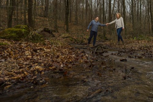 Adventurous winter engagement session at Sweetwater Creek Park